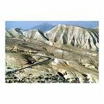 The stark, beautiful land of Jordan, populated by small box-like houses,