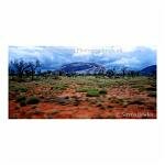 Rain pours down the Olgas, as storm clouds fill the sky Australia.