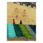 Saris - the traditional dress for women, still worn today - laid out in the sun to dry along the ghats of Varanasi, India.
