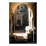 View through an arch to a coourtyard in Syria.