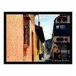 A bus driver takes a rest next on a doorstep. Antigua, Guatemala.